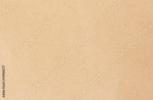 Brown or yellow paper texture background,Cardboard paper background,spotted blank copy space background in beige brown