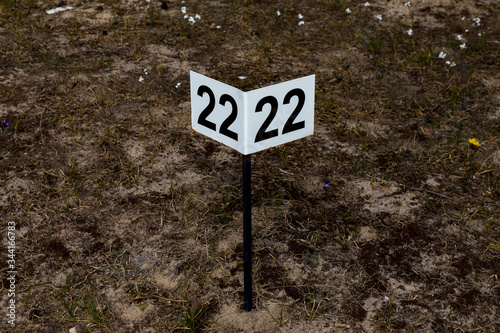 sign that says Twenty-two in a cemetary
