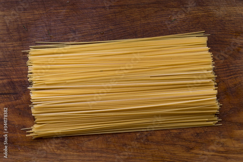 spaghetti on a wood background