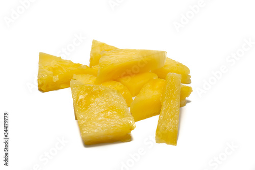 Fresh pineapple on a white background. Sliced exotic fruit waiting to be eaten.