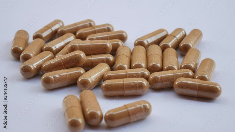 Close up pill on white. Close up pill on white.