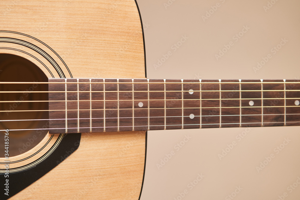 The Guitar deck. Acoustic guitar. Musical instrument. Close-up. fretboard acoustic guitar