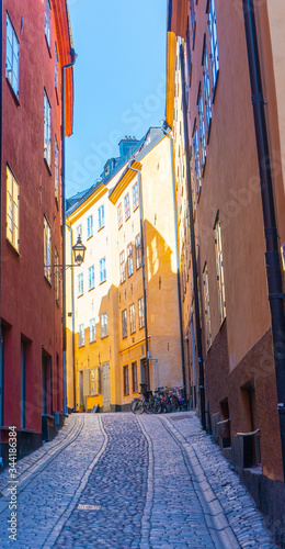 Narrow street in Stockholm. The old town (gamla stan) of the Swedish capital. Photo of medieval architecture. © Viktoras