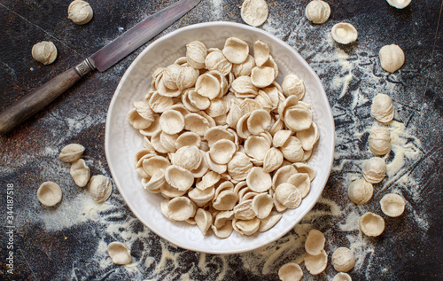 Fresh raw  italian pasta orecchiette photo