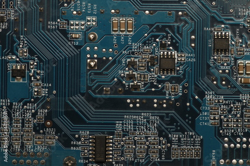 Closeup on electronic devices on boards, background images. Electronic board for computer and electronic control units. Card with integrated circuit and other electronic components.