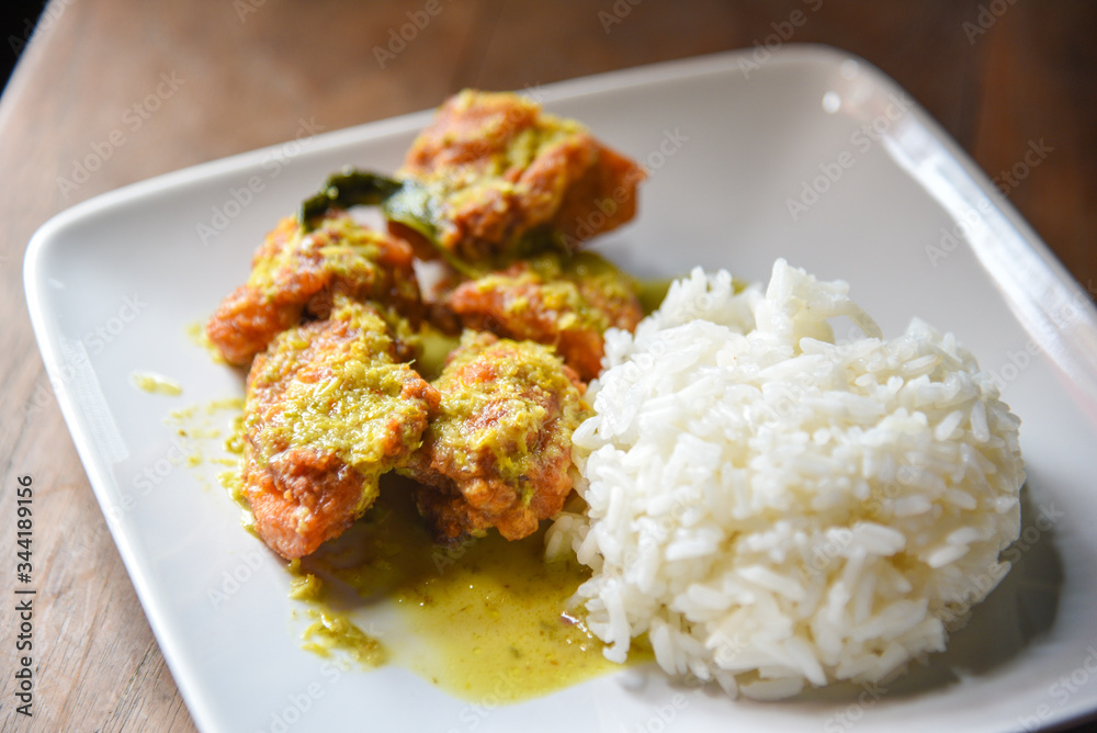 Deep Fried Chicken and Green Curry with Rice , vegetable in White plate. Thai food Deep Fried Chicken and Green Curry with Rice , vegetable in White plate. Thai food