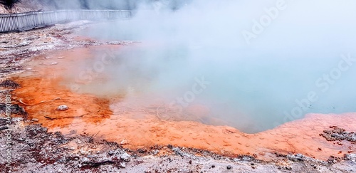 Champagne Pool in Waiotapu, New Zealand The Champagne Pool is a hot spring in the region of Waiotapu, New Zealand. Due to the deposits it contains, it bubbles like champagne and has bright colors. © Tania