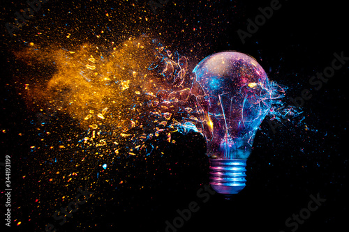 Fototapeta explosion of a traditional electric bulb