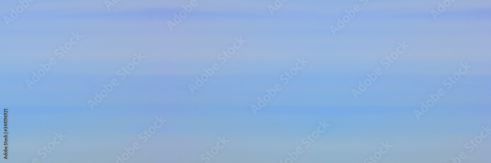 Blue cloudy sky background. Empty pale blue sky texture wallpaper, elongated bluish cloudscape banner. Wide sky template, blank environment template