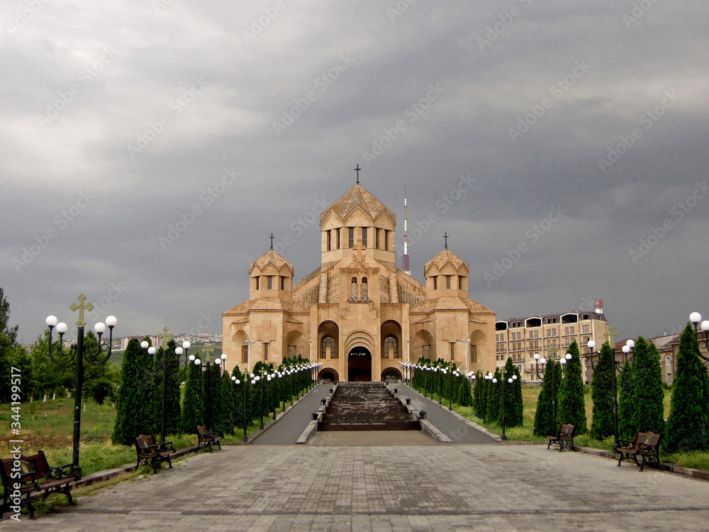 Panorama of empty alley on the way to the Saint Gregory the Illuminator Cathedral under the rainy sky, Yerevan, Armenia. It's one of largest churches in country.