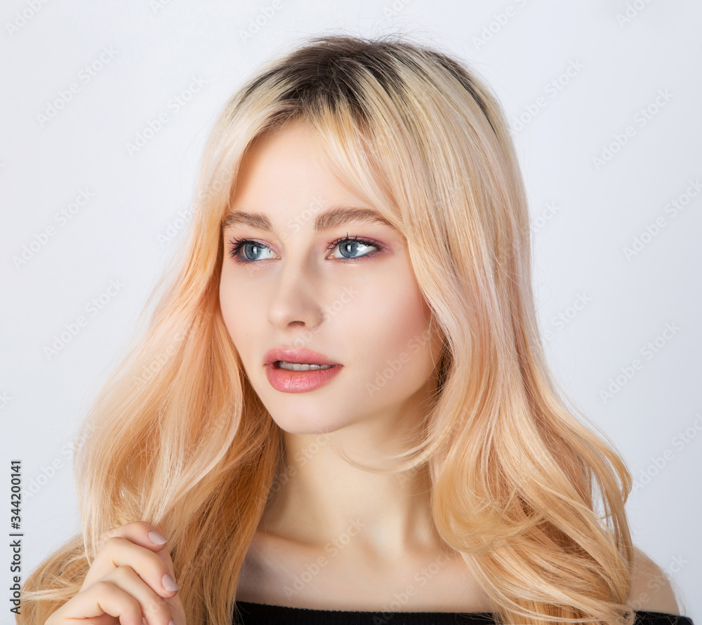 Portrait of a blond girl with dark roots. Portrait of a blond girl with dark roots.