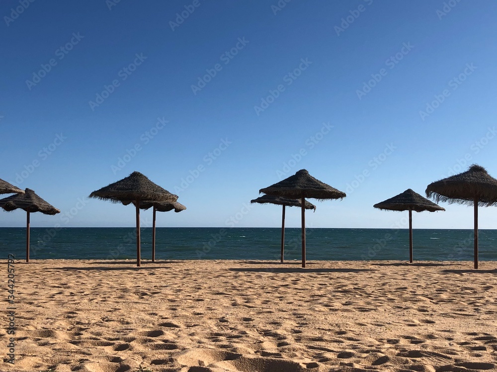 beach with umbrella