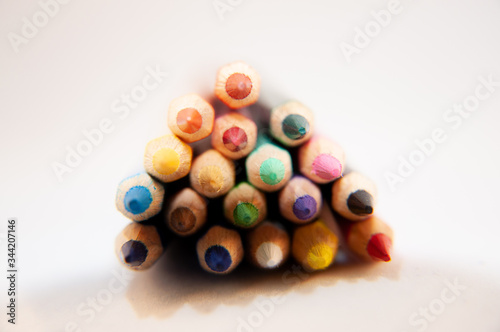 colored pencils on white background