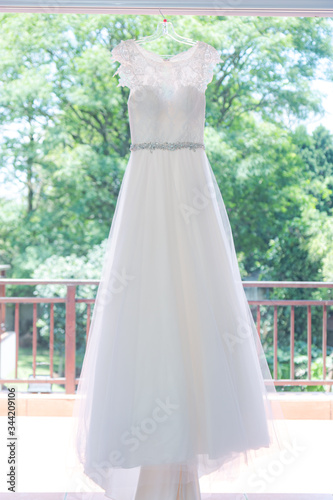 White wedding dress on a hanger