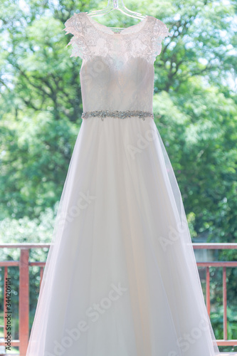 White wedding dress on a hanger