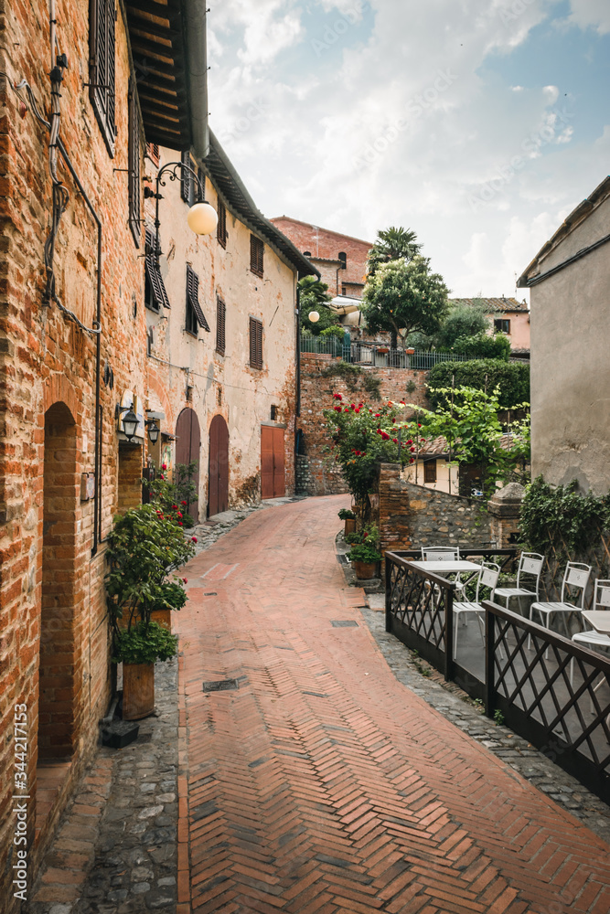 Alley in the ancient Tuscan village of Certaldo where the famous writer Giovanni Boccaccio was born and died on a summer morning