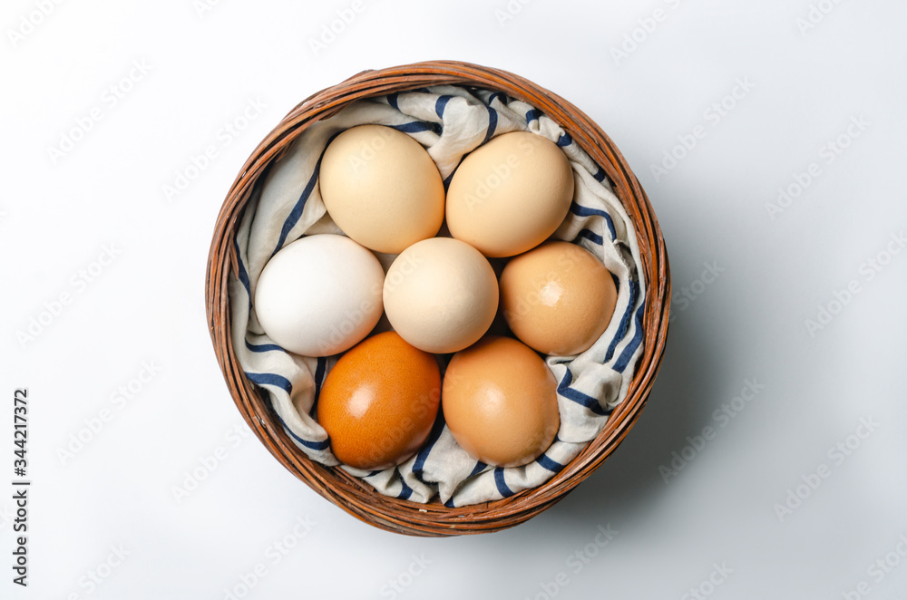eggs in basket on white ground eggs in basket on white ground