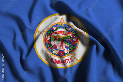 Flag of minnesota, USA with waving fabric texture 