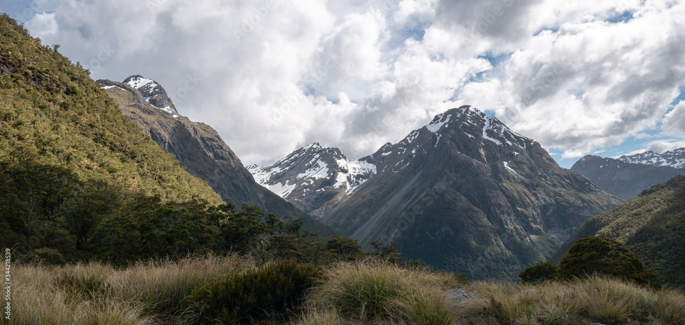 Mountains panorąma during overcast day, shot on Caples Track, New Zealand