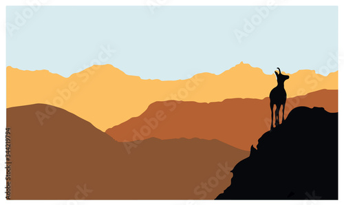 A chamois stands on top of a hill with mountains in the background. Black silhouette with brown and orange background. Vector illustration.