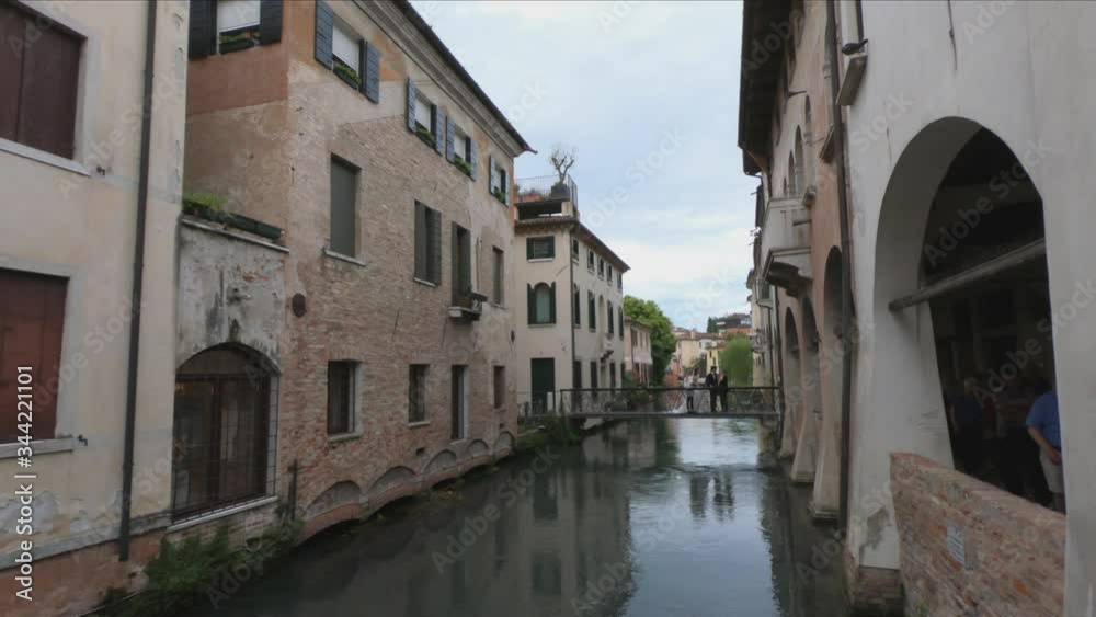 PAN SLOW MOTION - The Buranelli Canal is named after the merchants from Burano who lived along this watercourse in the 1500s. Cityscape with old houses on the canale. PAN SLOW MOTION - The Buranelli Canal is named after the merchants from Burano who lived along this watercourse in the 1500s. Cityscape with old houses on the canale.