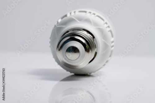Close up shot of LED lamp with e27 type socket on an isolated white background