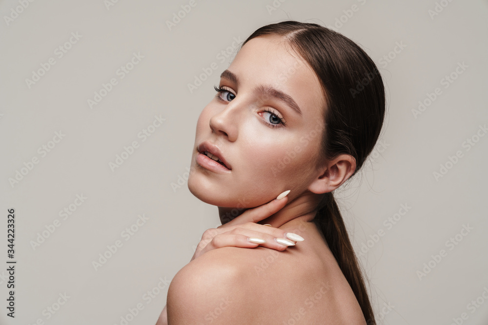 Image of seductive nice shirtless woman posing and looking at camera Image of seductive nice shirtless woman posing and looking at camera