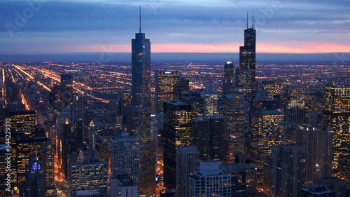 CHICAGO, ILLINOIS, UNITED STATES - DEC 11th, 2015: Aerial view of Chicago downtown at twilight from John Hancock skyscraper high above