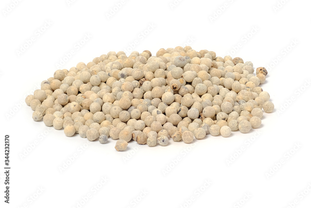 White pepper in a yellow bowl isolated on a white background. White pepper in a yellow bowl isolated on a white background.