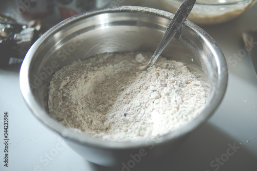 Flour inside of a metal bowl