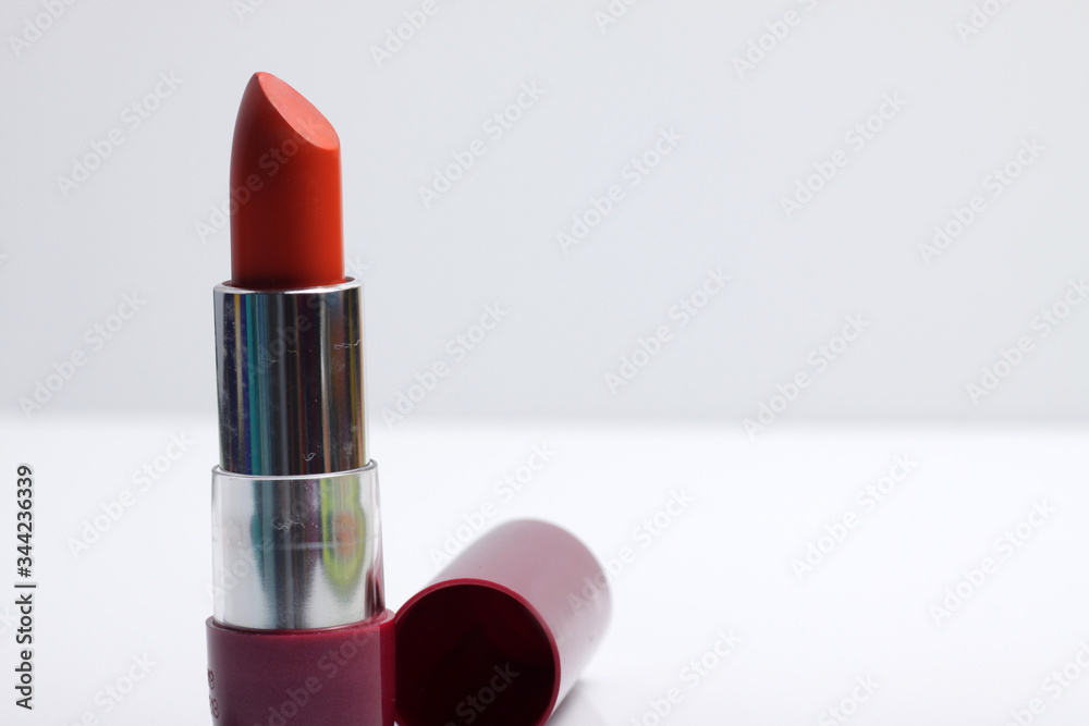 Close up shot of red lipstick on a white background Close up shot of red lipstick on a white background