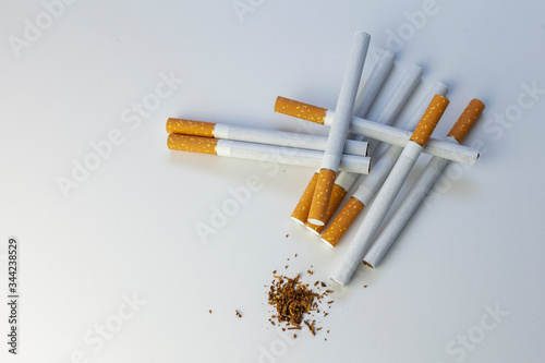 Tobacco. Cigarettes on a white background, top view photo