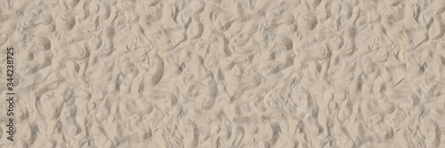 Leerer Sandstrand mit Sand am Strand von oben