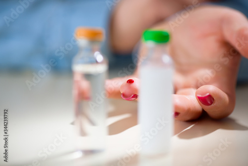 Examine sugar. Blocking sugar testing, woman finger lancet punctures. Close up.
