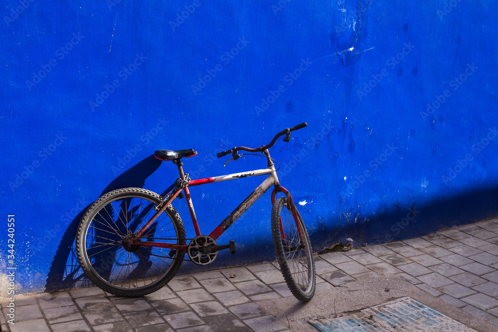 Blue wall and a bicycle, Morocco