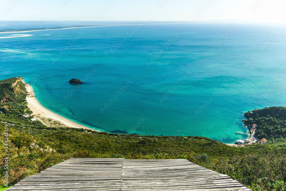 An astonishing view of the paragliding platform in the Serra da Arrábida, Setúbal, Portugal. It overviews the Portinho da Arrábida in the background. An astonishing view of the paragliding platform in the Serra da Arrábida, Setúbal, Portugal. It overviews the Portinho da Arrábida in the background.