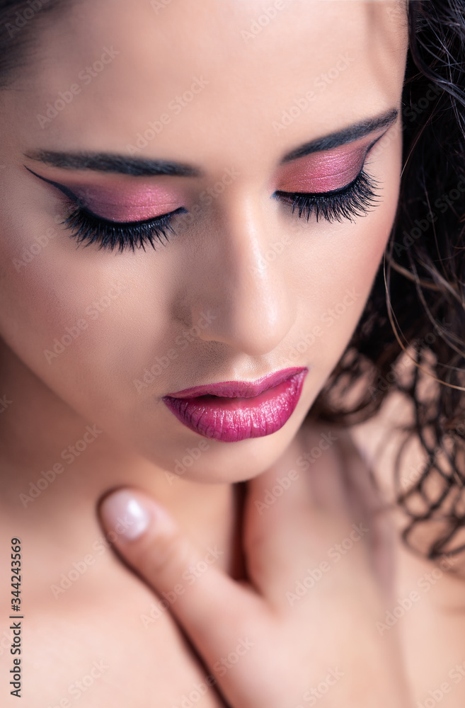 Details of a beauty makeup in berry shades Details of a beauty makeup in berry shades