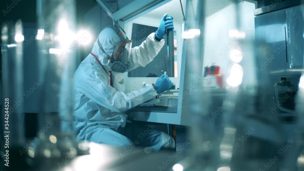 Researcher is analyzing biological probes in the laboratory. Coronavirus, COVID-19 antibody concept. Researcher is analyzing biological probes in the laboratory. Coronavirus, COVID-19 antibody concept.