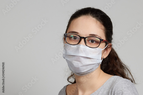 portrait of people in a medical mask a Girl with a medical mask a boy in a mask, to protect against the spread of the virus