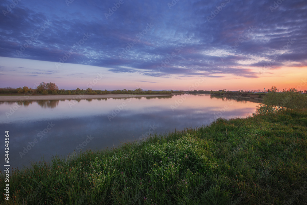 sunset on the quiet Kuban river, which originates from the Caucasus-Elbrus