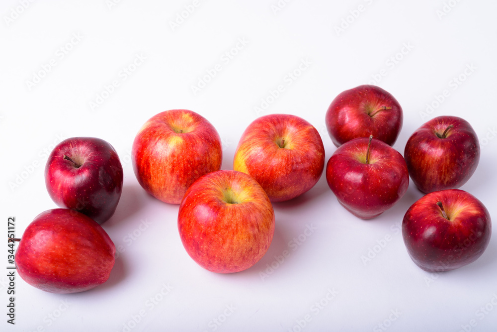 Portrait Of Fresh Red Apples Against White Background Portrait Of Fresh Red Apples Against White Background
