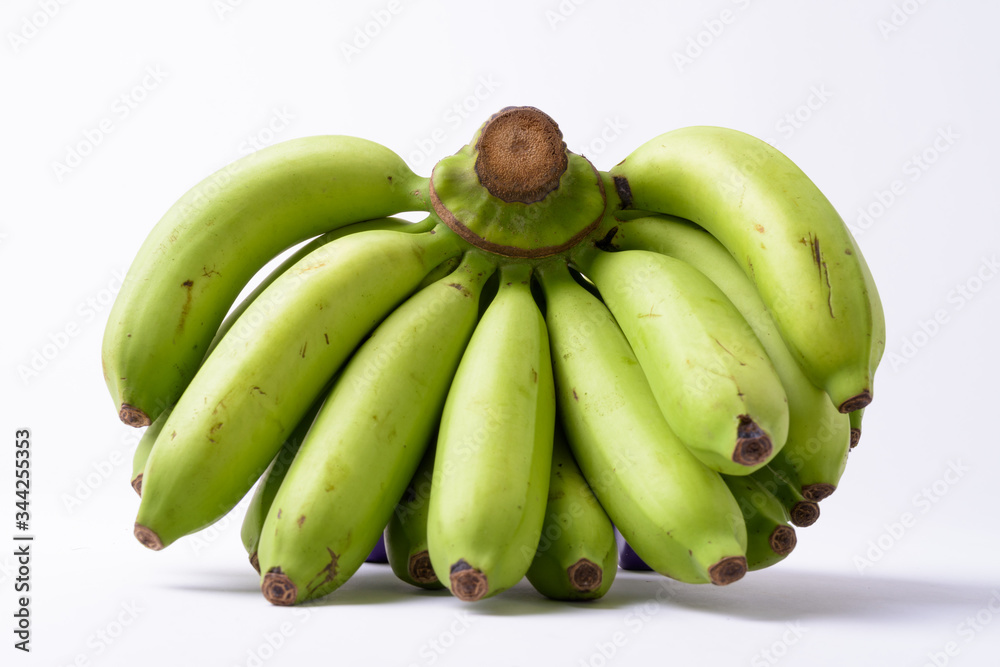Portrait Of Green Bananas Against White Background