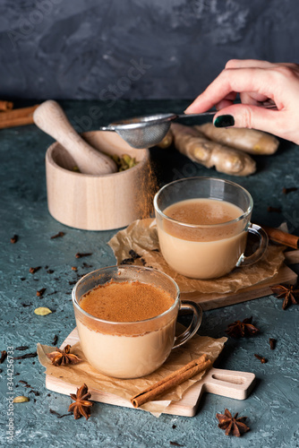 Glass cups of traditional Indian masala chai © romanovad