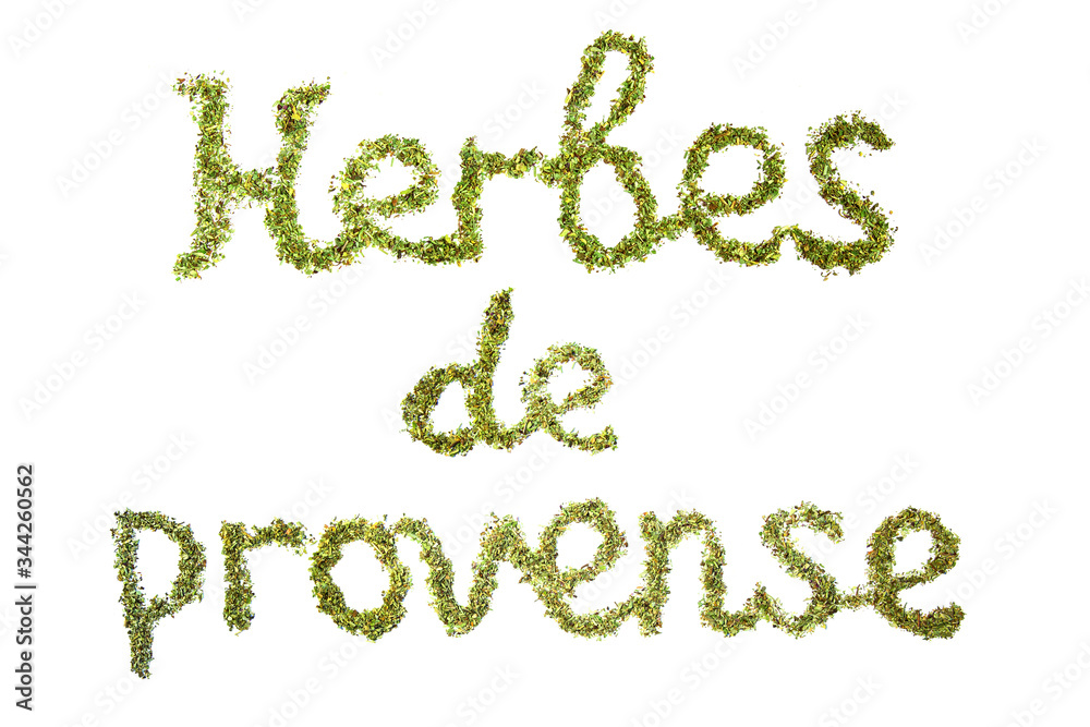 Inscription in french provence herbs on a white isolated background. Flat lay. Made from provence herbs. Inscription in french provence herbs on a white isolated background. Flat lay. Made from provence herbs.