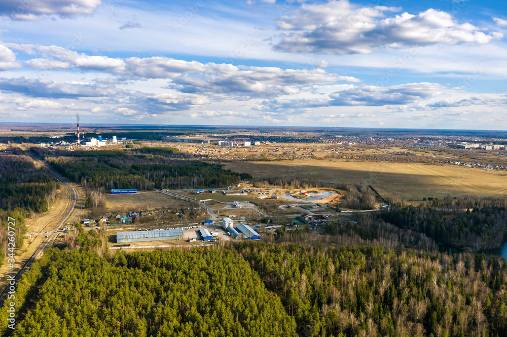 A panorama of the outskirts of the city of Ivanovo from a bird's flight on a spring sunny day.