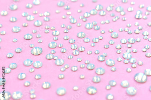 Bild auf Leinwand Diamonds, rhinestones on a pastel pink background