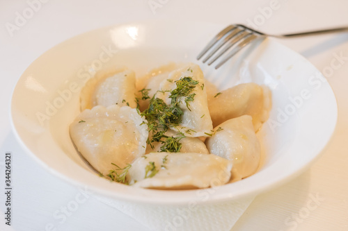 delicious dumplings with herbs and coffee