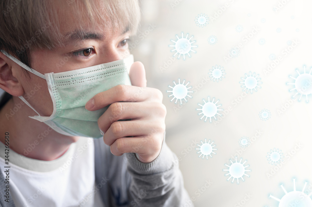 Young asian man wearing medical face mask with coughing on white background Young asian man wearing medical face mask with coughing on white background