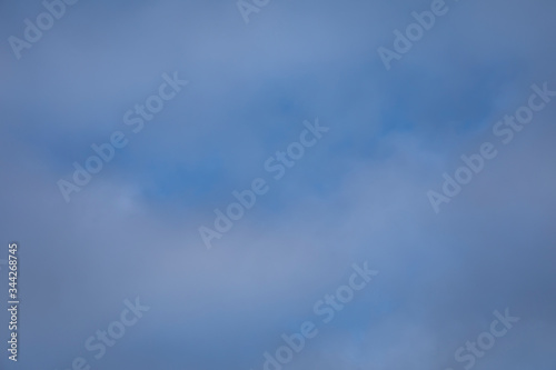 Soft white clouds against blue sky. Air background