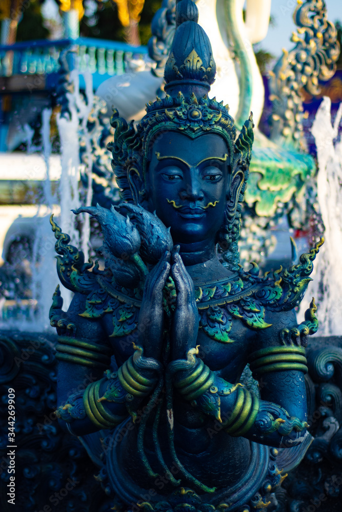 A beautiful view of Wat Rong Suea Ten, the Blue Temple at Chiang Rai, Thailand.